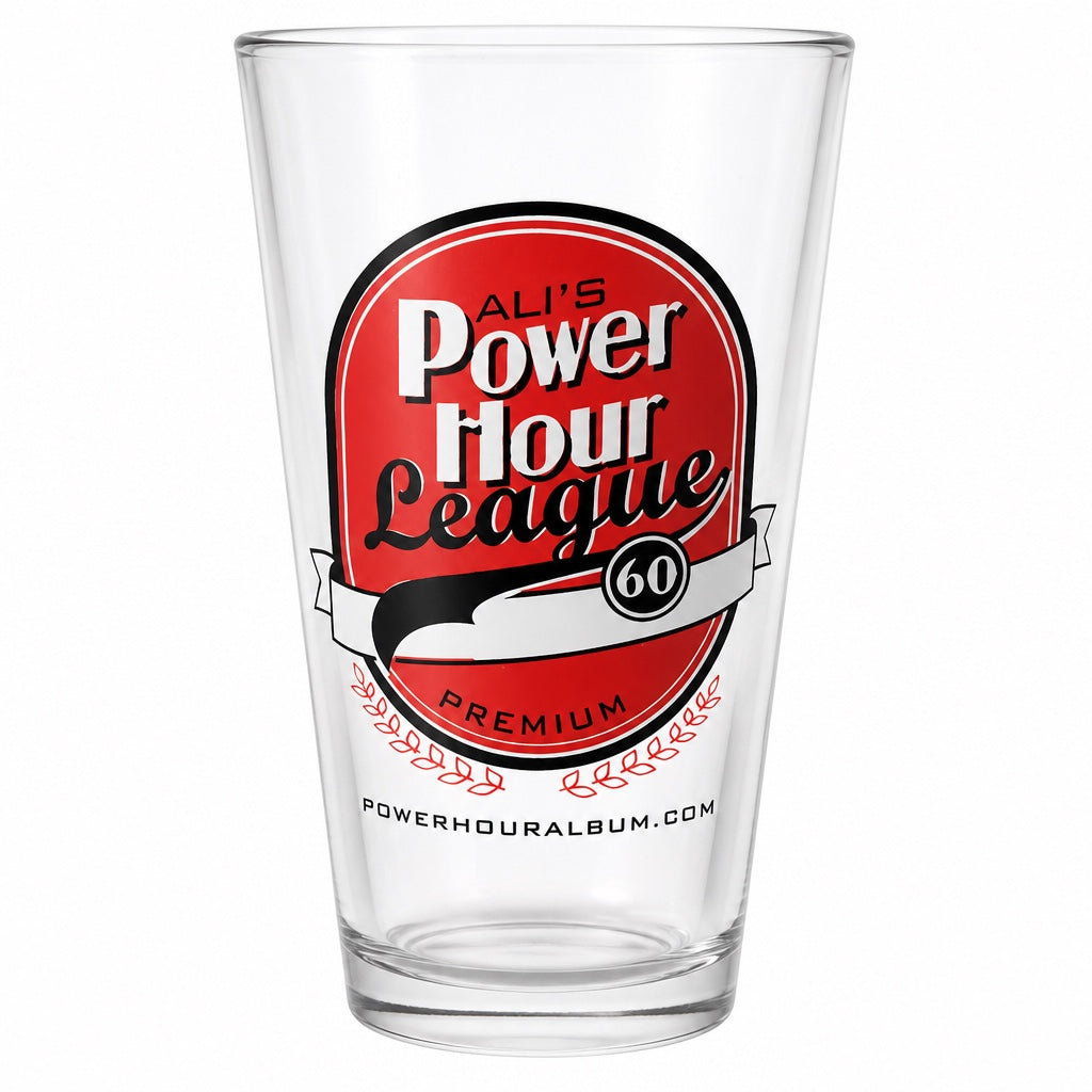 Outrageous Art Power Hour League pint glass with a red and black logo featuring the number 60 on a clear glass surface.