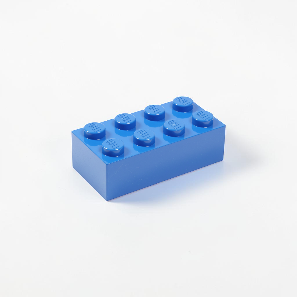 Outrageous Art blue plastic building block sculpture from the Lego Toilet project on a white background