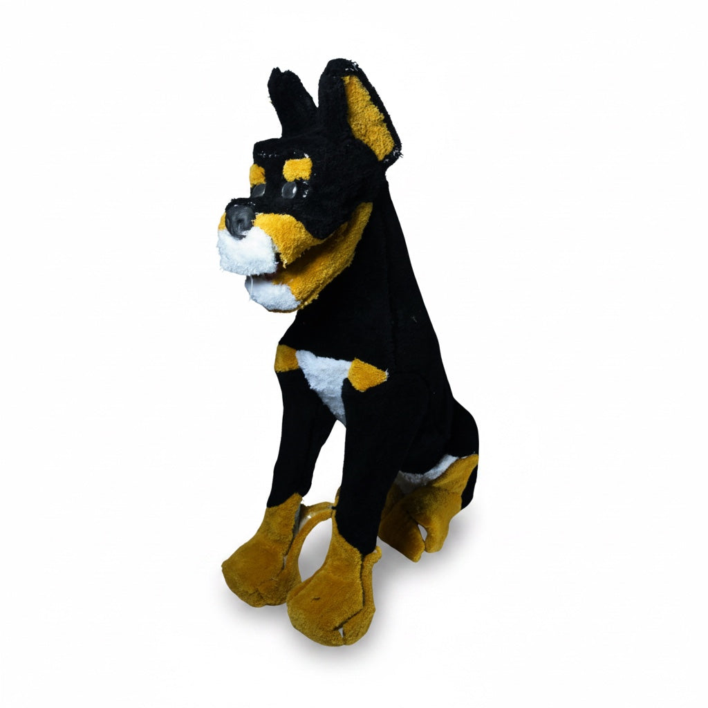 Outrageous Art 3D Braxton dog rug sculpture featuring black, tan, and white tactile plush fabric in a sitting pose.