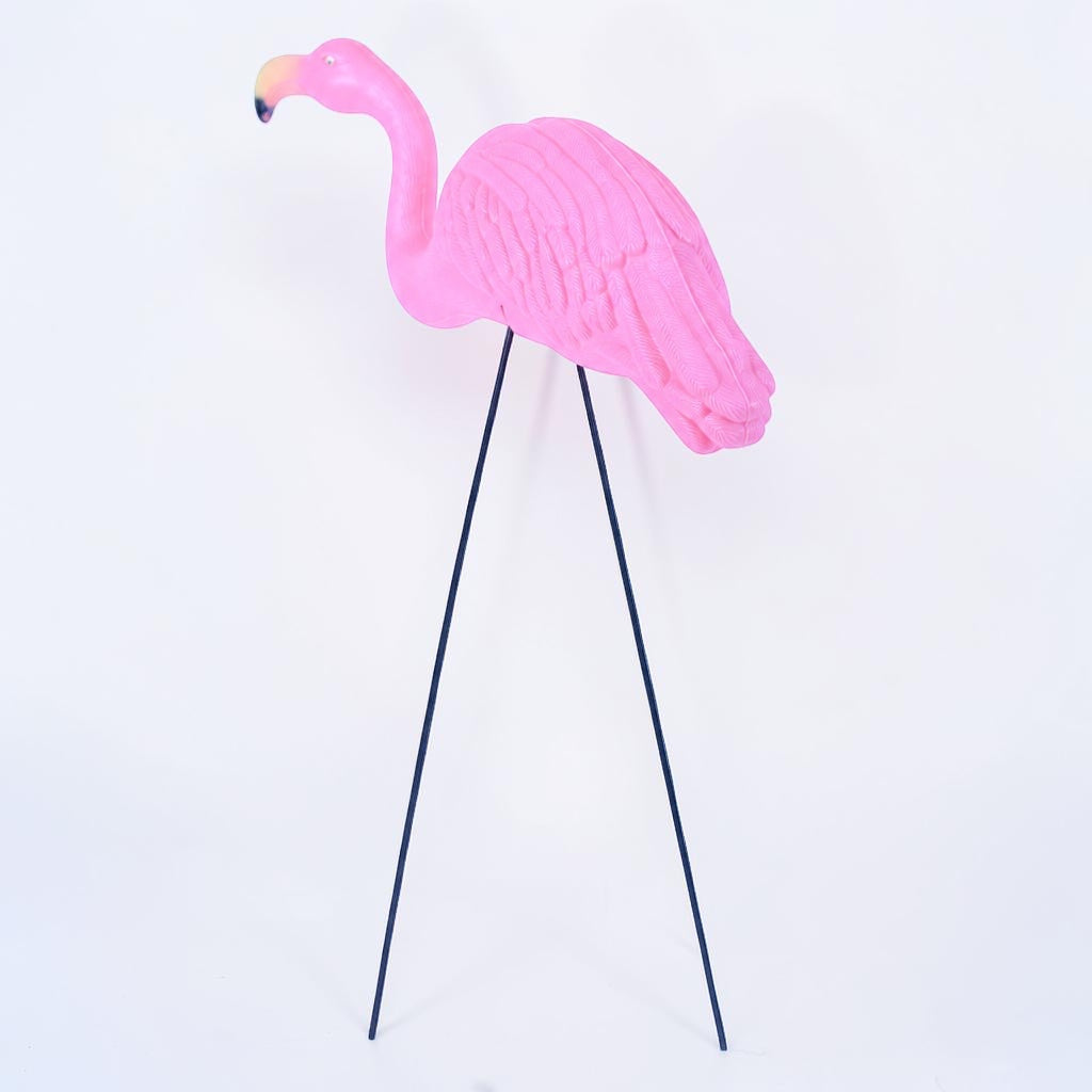 Outrageous Art Flamingo 2 yard ornament in vibrant pink with long metal legs for a playful retro garden accent.
