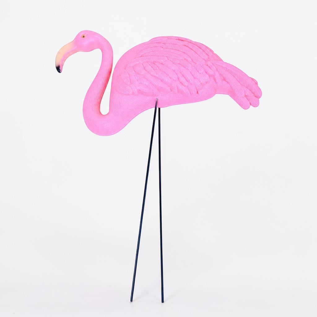 Outrageous Art Flamingo 1 yard ornament in bright pink with textured feathers and thin metal legs on white background