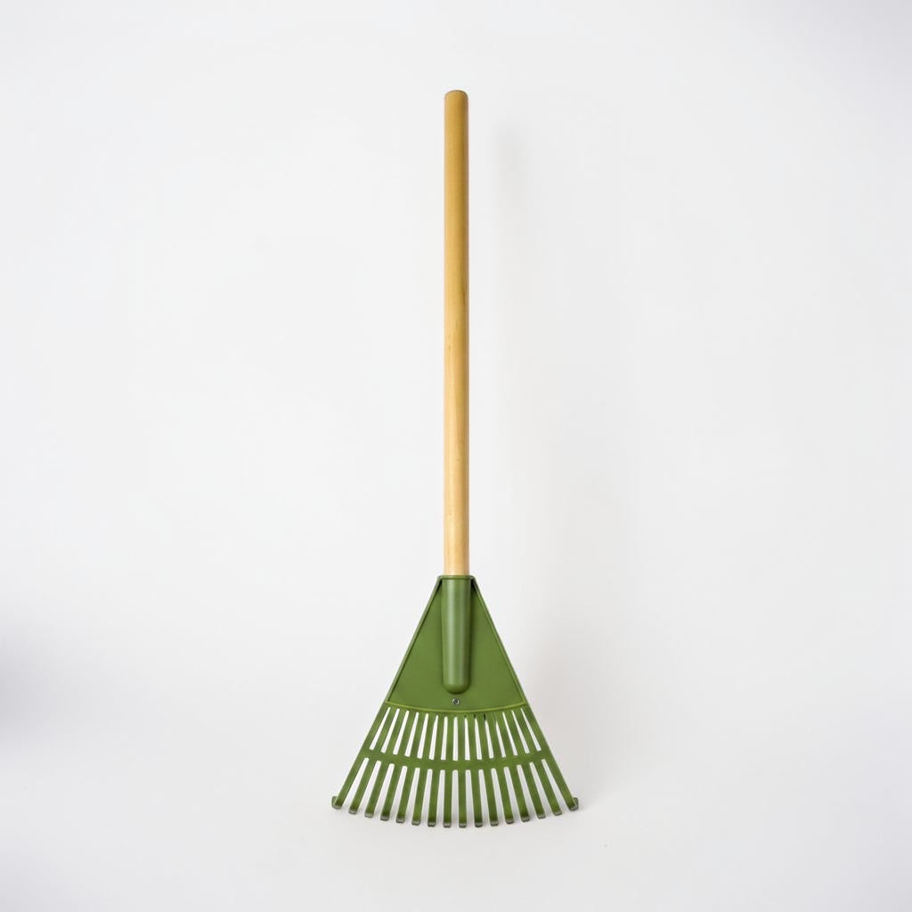 Outrageous Art long handled garden leaf rake with a natural wood handle and durable green plastic tines.