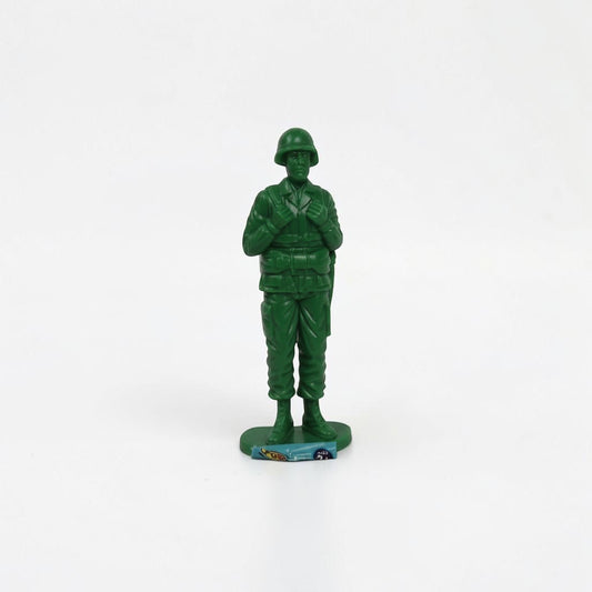 Outrageous Art classic green plastic miniature soldier action figure in a standing pose with helmet and uniform