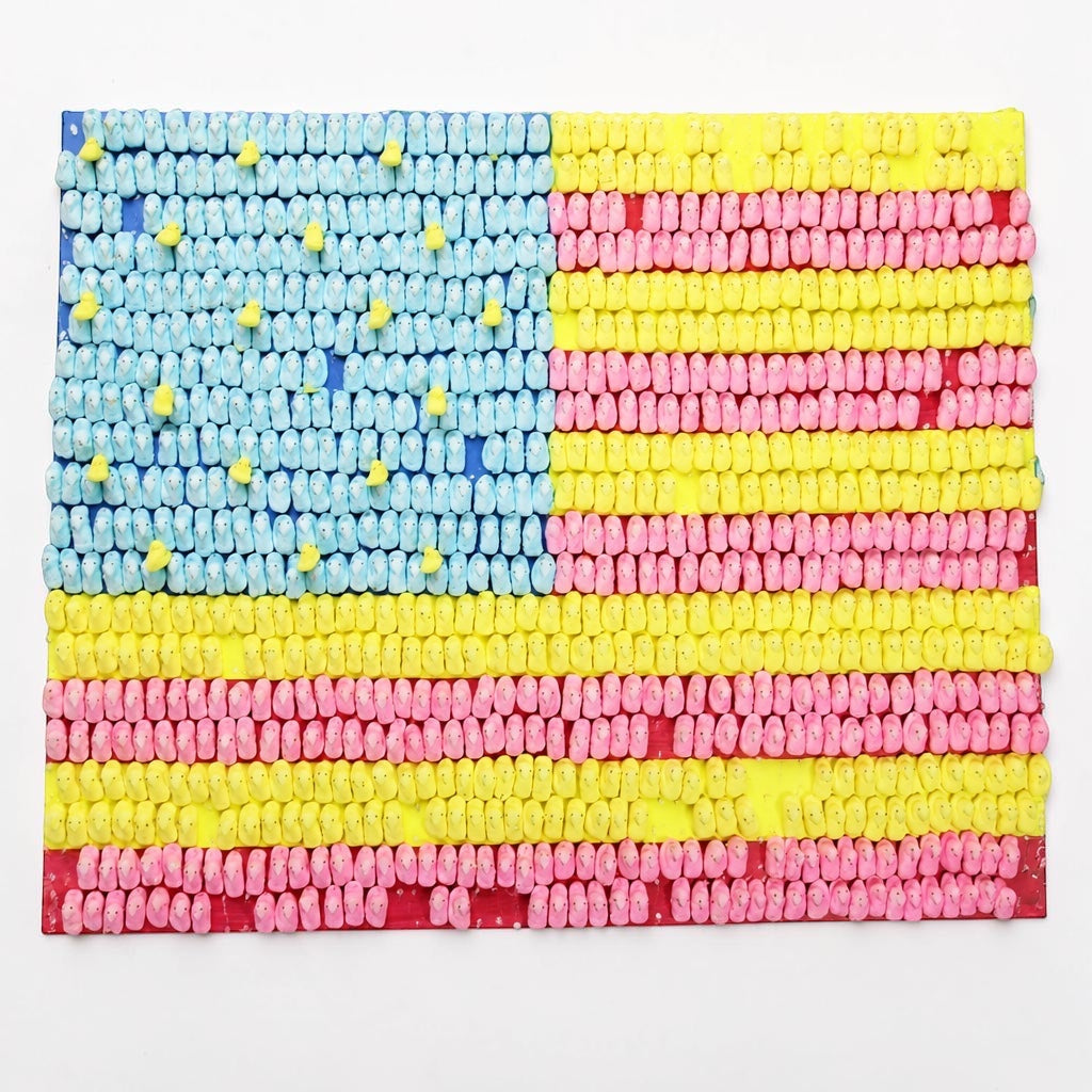 Outrageous Art patriotic American flag wall art made from colorful blue, yellow, and pink marshmallow candies.