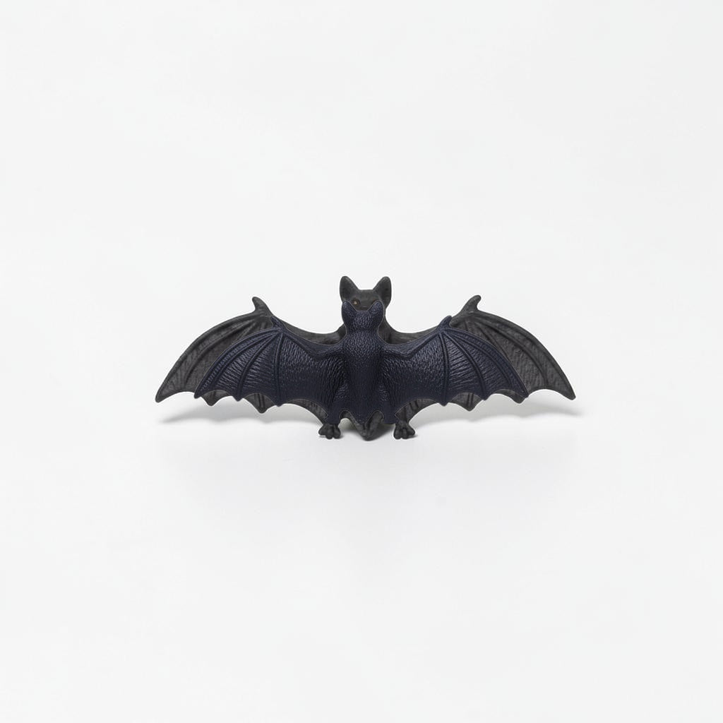 Outrageous Art miniature black bat figurine with detailed wings, perfect for dioramas or wildlife collections.