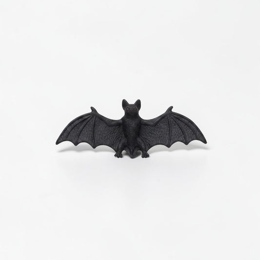 Outrageous Art miniature black bat figurine with detailed wings and realistic texture on a white background