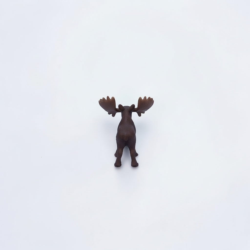 Outrageous Art miniature brown moose figurine viewed from behind on a plain white background