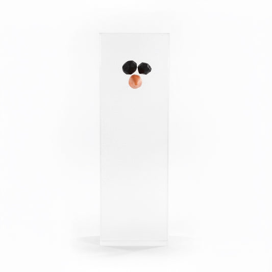 Outrageous Art Minimalist Snowman sculpture by Ali Spagnola featuring a clear block with chicken wire nose and eyes