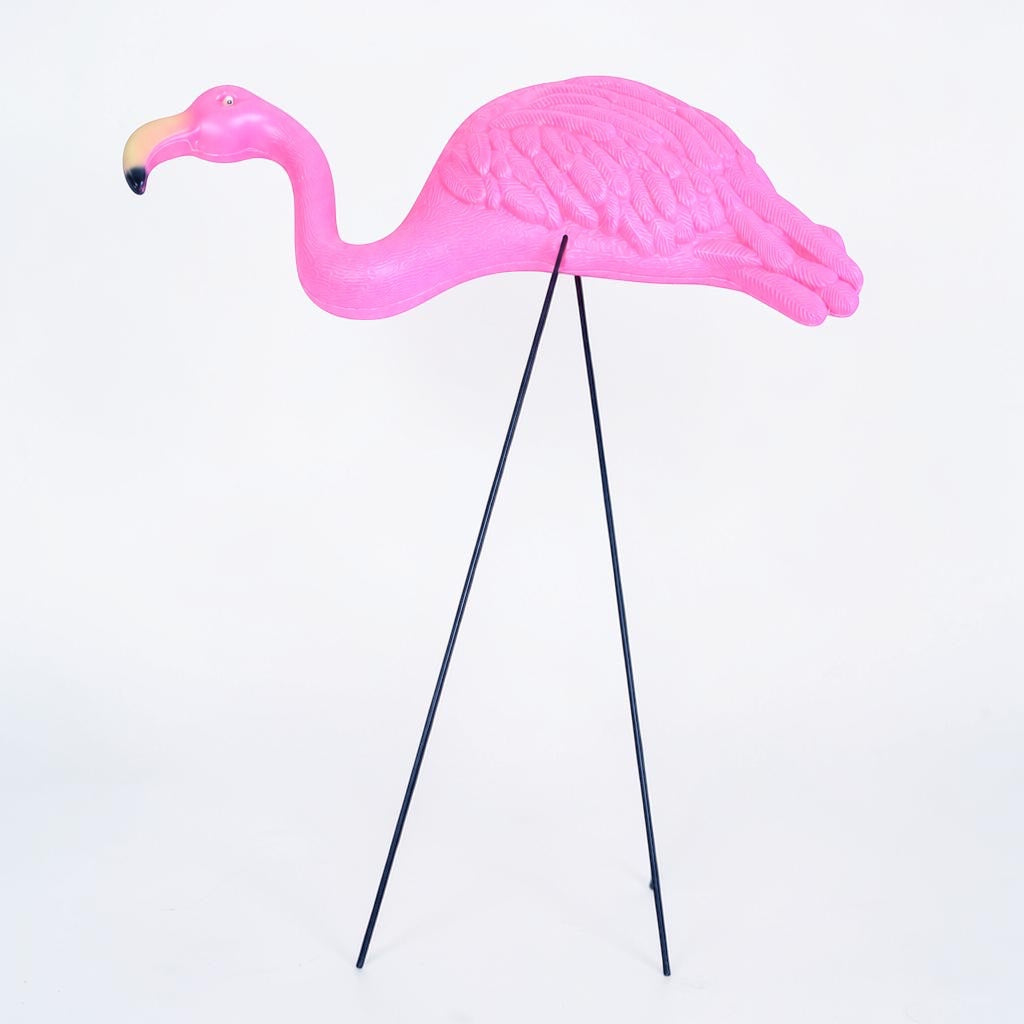 Outrageous Art Flamingo 2 vibrant pink plastic yard ornament with retro charm and thin metal legs for garden decor.