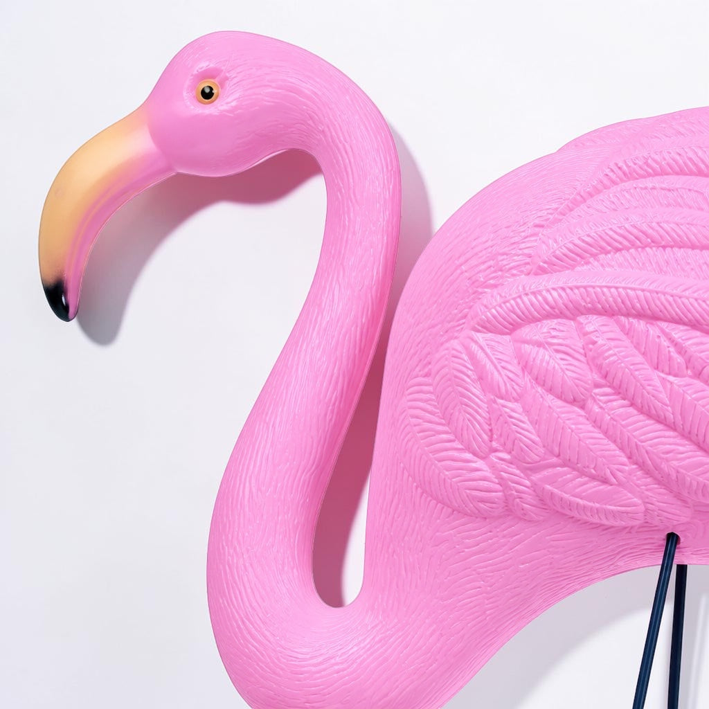 Outrageous Art Flamingo 1 yard ornament featuring a vibrant pink plastic bird with detailed feather textures.
