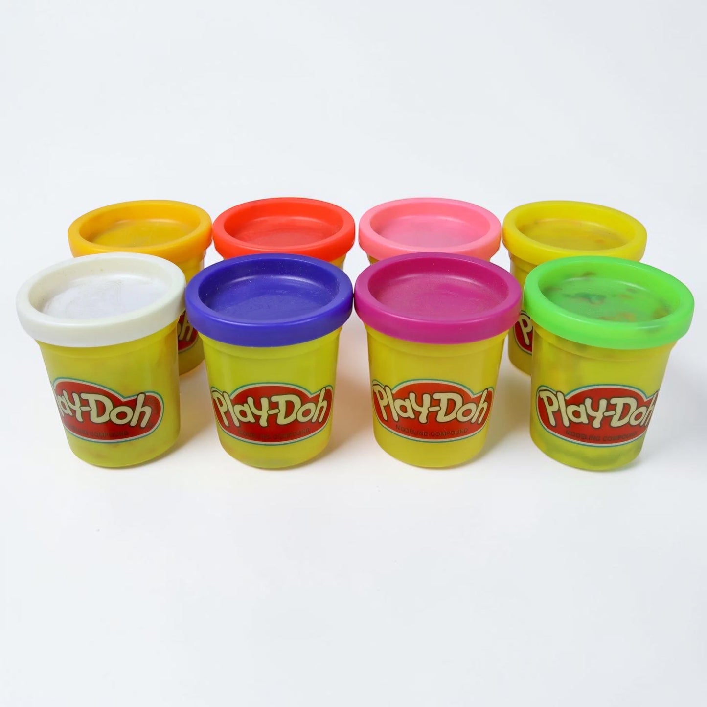 Outrageous Art Play-Doh modeling compound set featuring eight vibrant, colorful containers of non-toxic play dough.