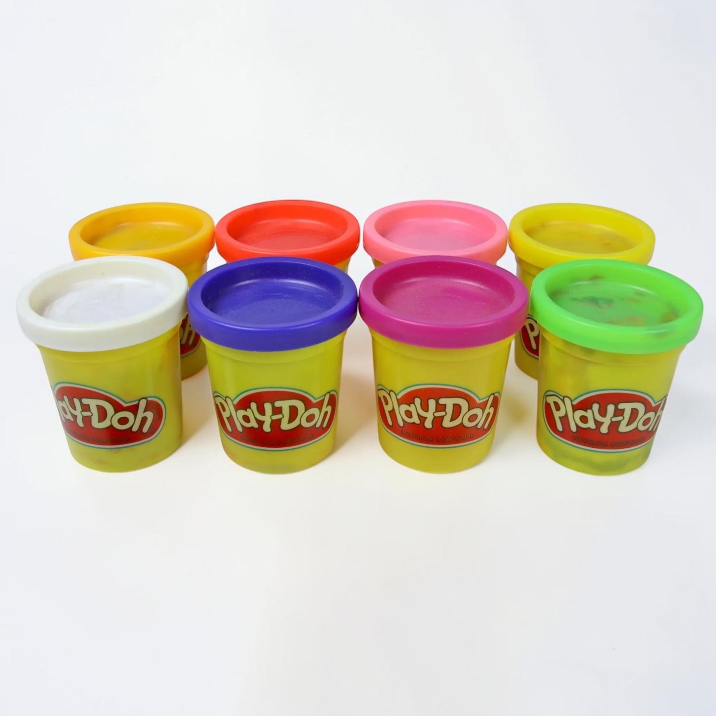 Outrageous Art Play-Doh modeling compound set featuring eight colorful, non-toxic dough containers for creative play.