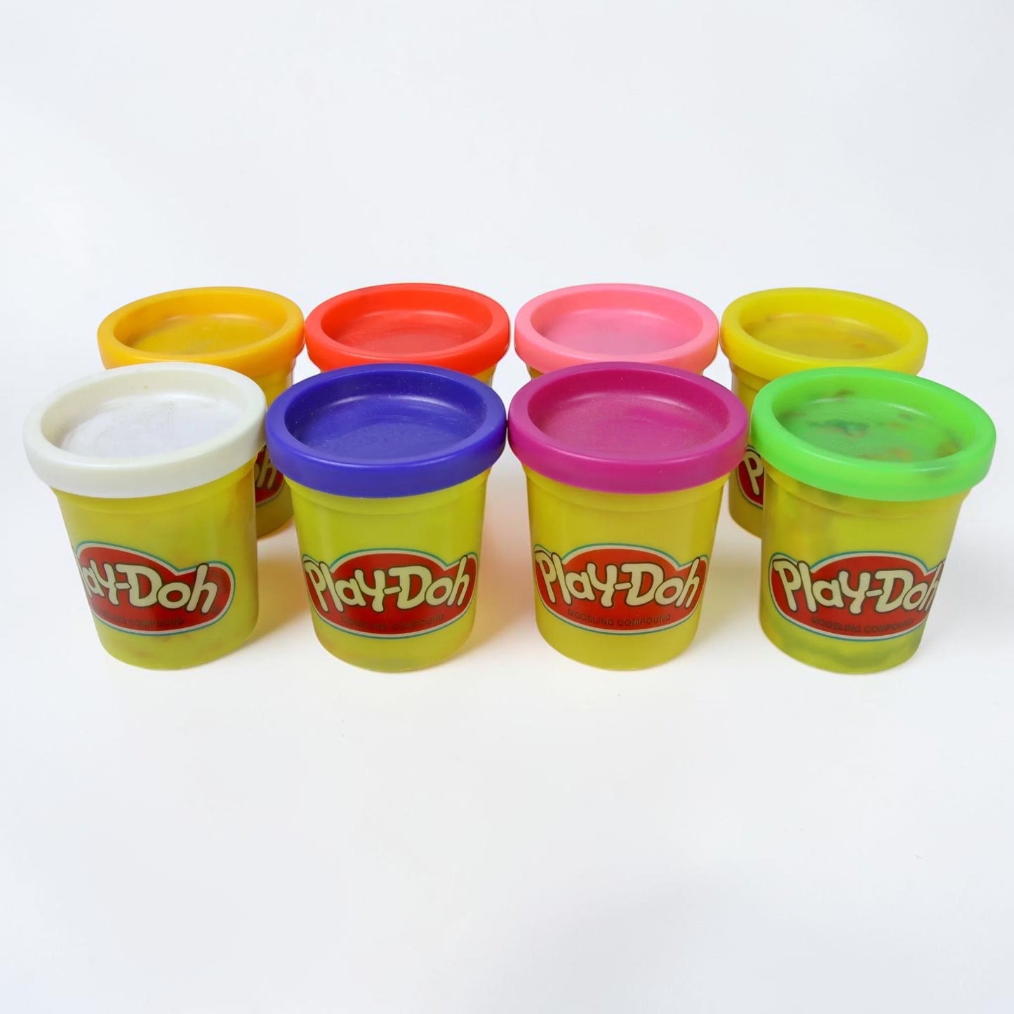 Outrageous Art Play-Doh modeling compound set featuring eight colorful, reusable containers for creative play.