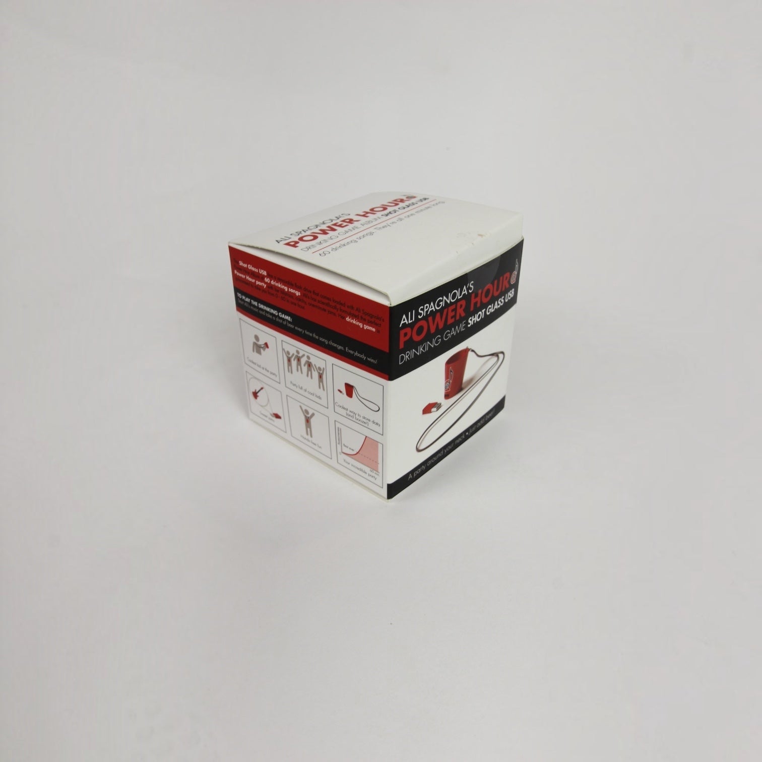 Outrageous Art Ali Spagnola Power Hour drinking game box featuring a shot glass and USB drive for party music.