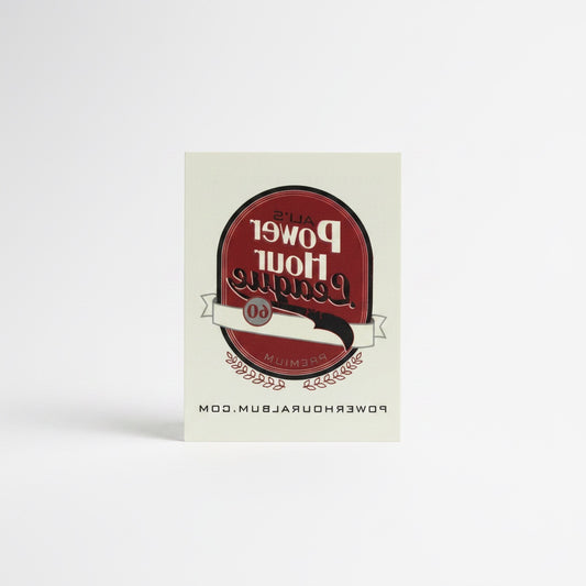 Outrageous Art Power Hour League adhesive sticker in red and white with vintage laurel leaf emblem design.