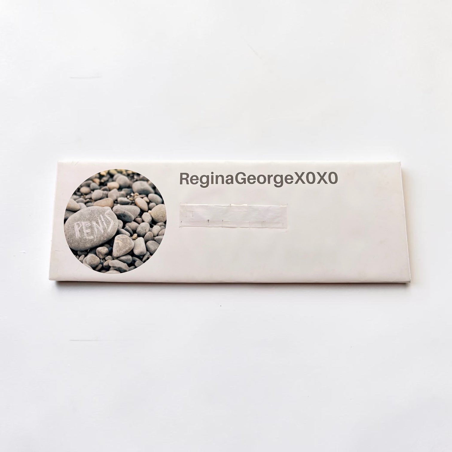 Outrageous Art prop comment featuring a circular photo of a rock with text on a white rectangular display board