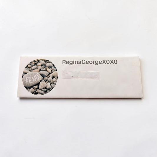 Outrageous Art prop comment featuring a circular photo of a rock with text on a white rectangular display board