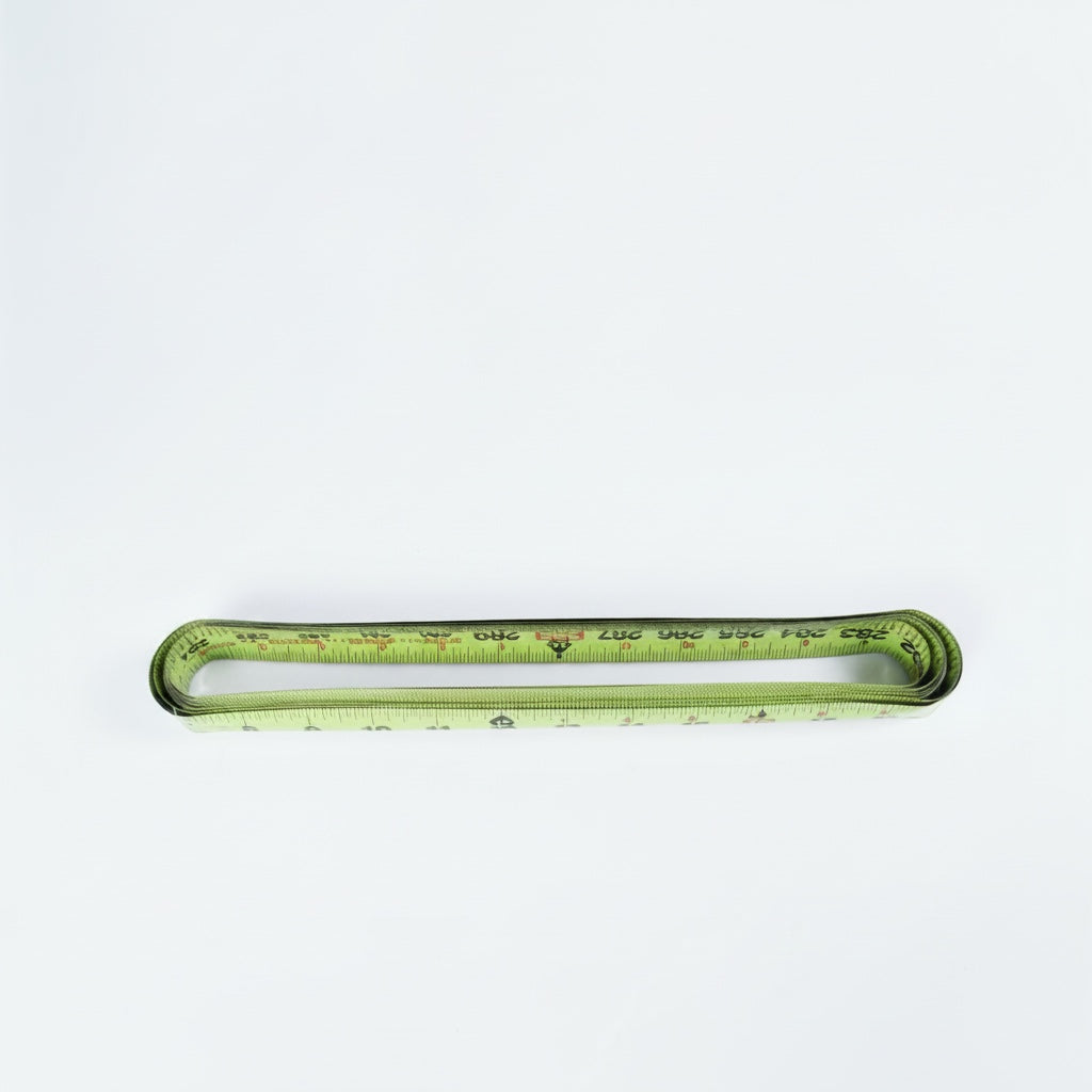 Outrageous Art professional retractable measuring tape with a high-visibility light green blade on a white background