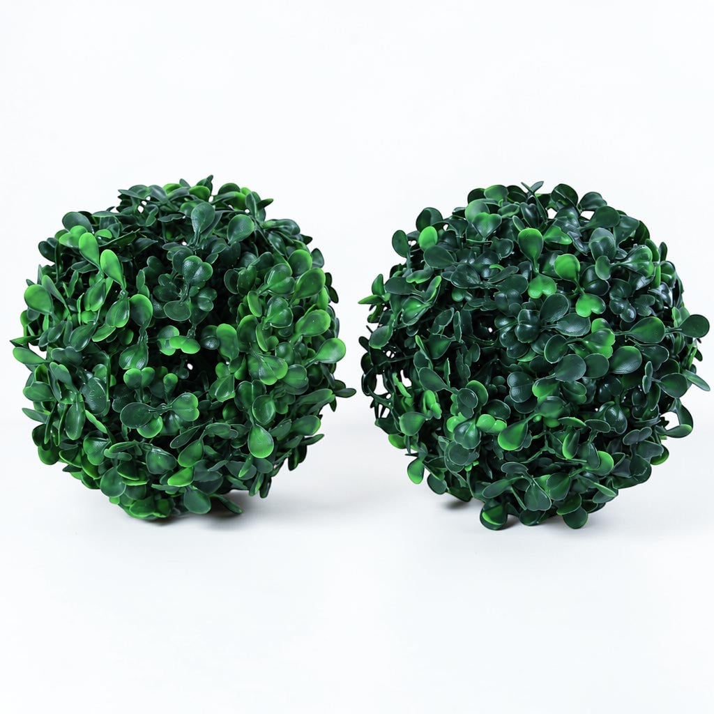 Outrageous Art sculptural round green bushes with dense spherical foliage for indoor or outdoor architectural decor.