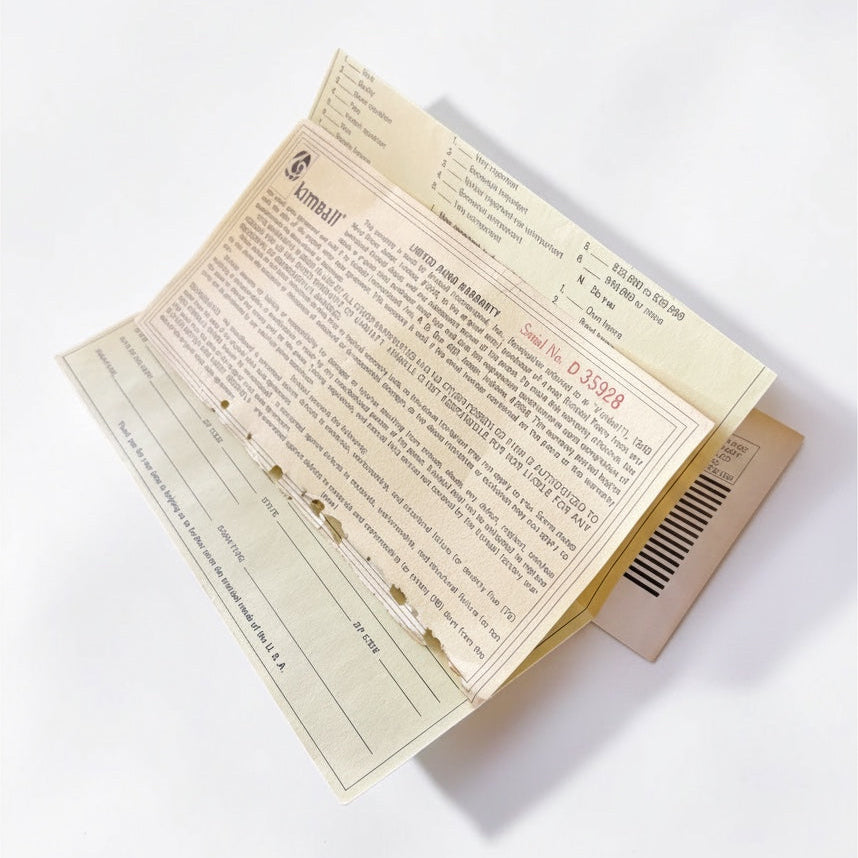 Outrageous Art vintage Kimball Piano limited warranty document with serial number D 35928 on aged paper stock