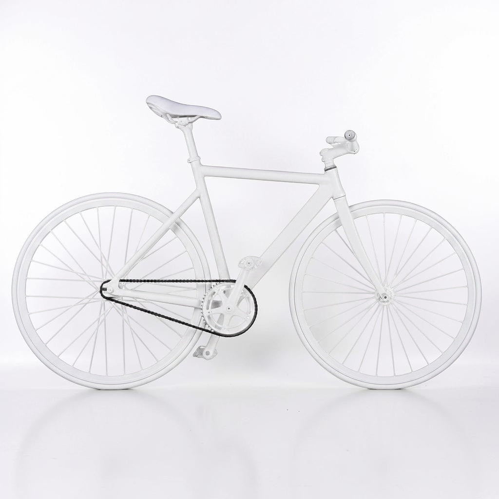 Outrageous Art Velvet Bike in solid white, featuring a unique plush velvet-covered frame and minimalist design.
