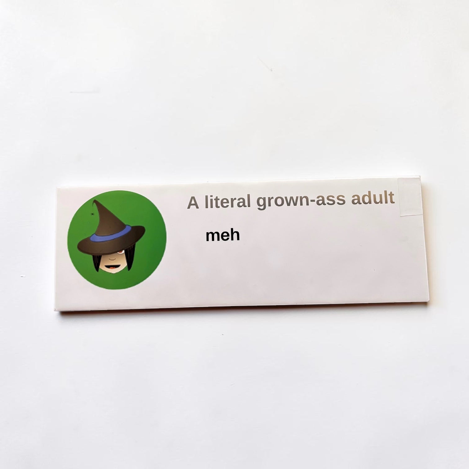 Outrageous Art collectible prop comment featuring a witch avatar and the text A literal grown-ass adult meh