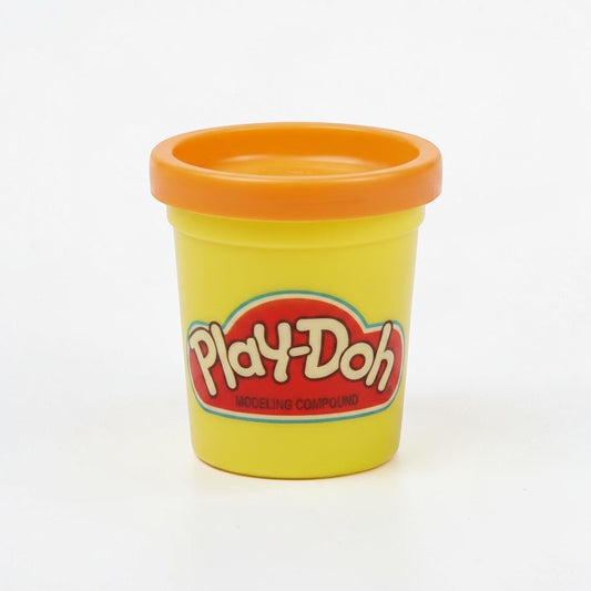 Outrageous Art yellow Play-Doh modeling compound container with an orange lid on a white background